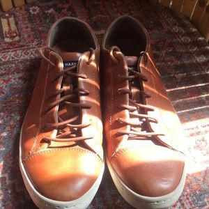 Cole Haan brown leather sneakers.